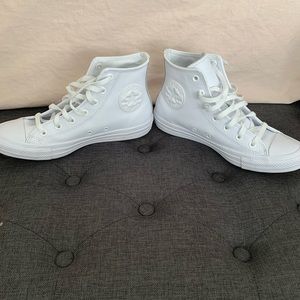 White leather Converse high tops